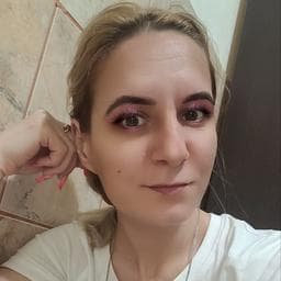 Roxana M poza de pe Taskuri.ro